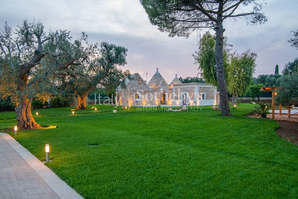 Renovated traditional Apulian trulli with swimming pool