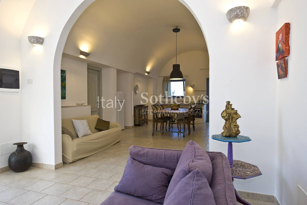 Old farmhouse with olive trees and a swimming pool